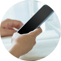 demo-attachment-1603-close-up-of-female-hands-using-smart-phone-while-PWQR3QP@2x